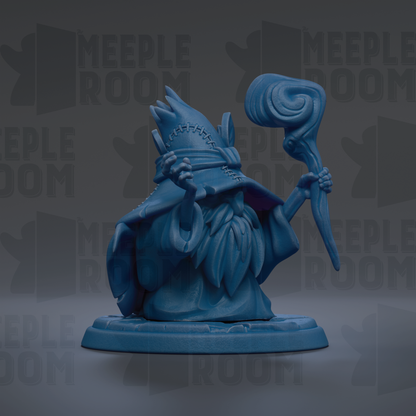 A blue figurine of a wizard or magical being holding a staff and standing on a pedestal.