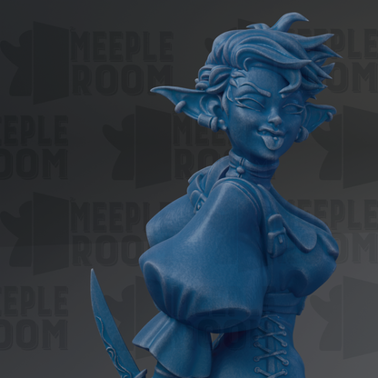 A blue statue of a woman with a pensive expression, holding a sword, and wearing a flowing dress.