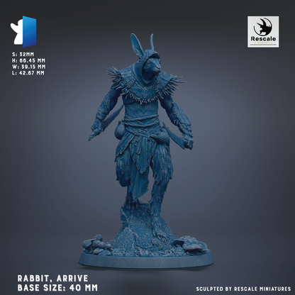 a blue, sculpted statue of a rabbit, with a detailed and intricate design.