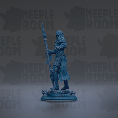 A blue figurine of a warrior standing on a pedestal, holding a spear and wearing armor.