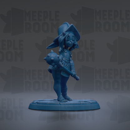 A blue figurine of a character with a pointed hat and a weapon, standing on a base.