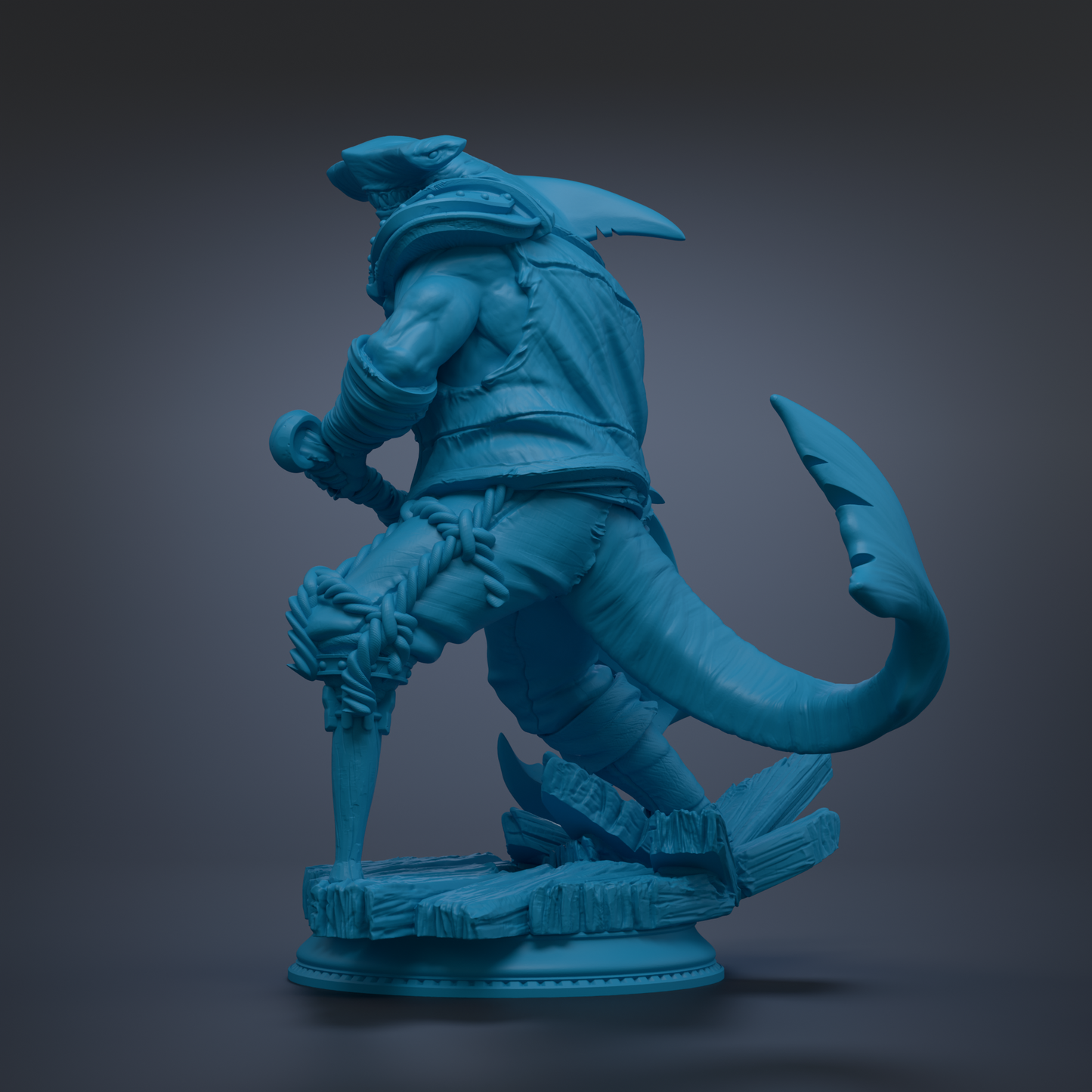 A blue, 3D-rendered statue of a fantastical creature with a large head, sharp teeth, and a long tail.