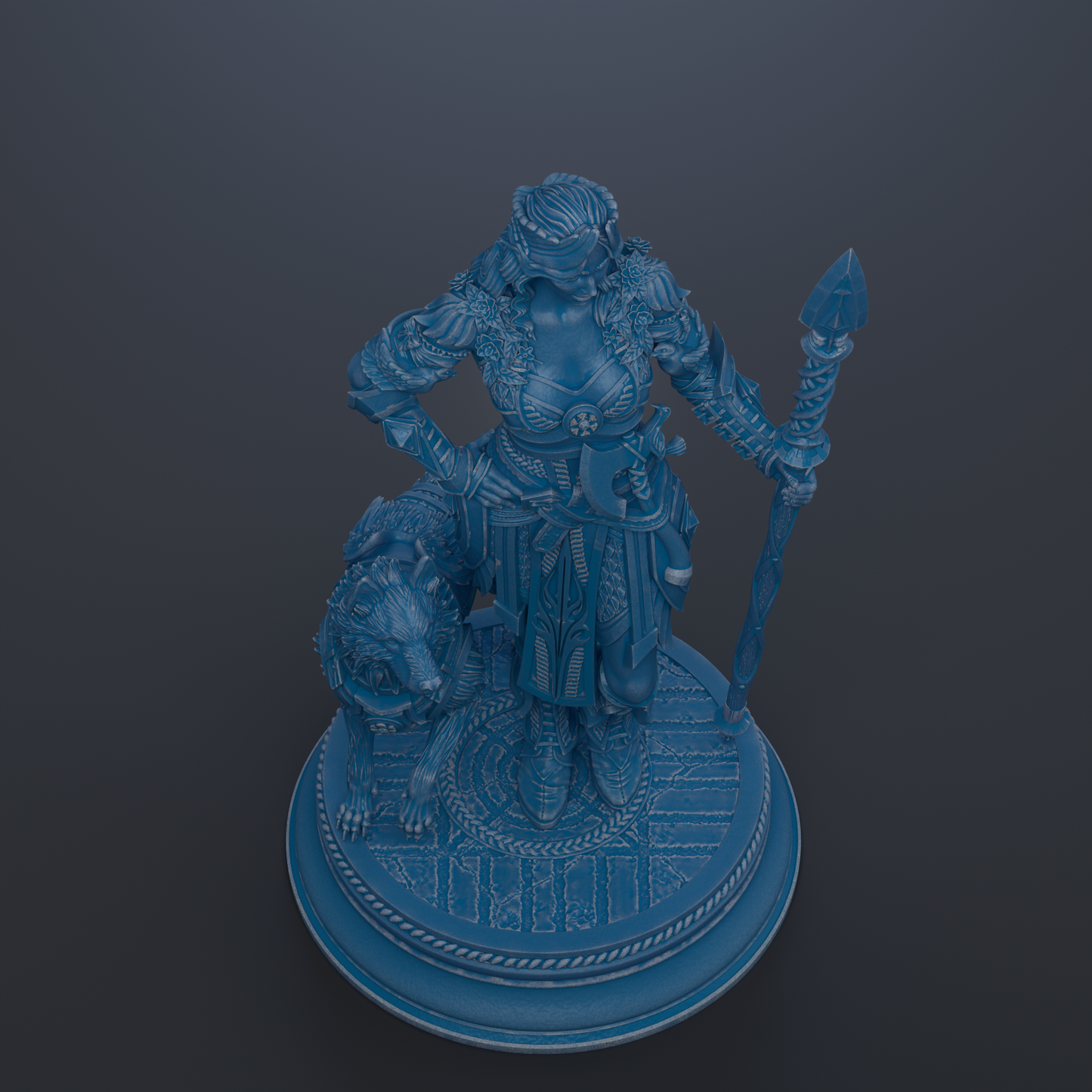 A blue statue of a warrior figure holding a spear and standing on a platform.