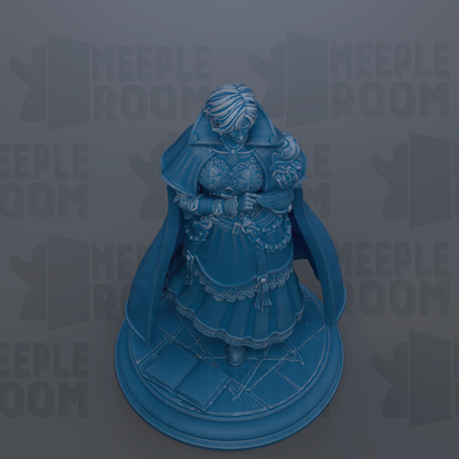 A blue statue of a woman with a flowing dress and a cape, standing on a pedestal.