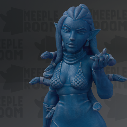 A blue statue of a woman with snakes wrapped around her body, wearing a bra-like top.