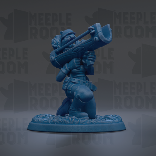 A blue figurine of a character holding a large object, possibly a tool or weapon, standing on a platform.