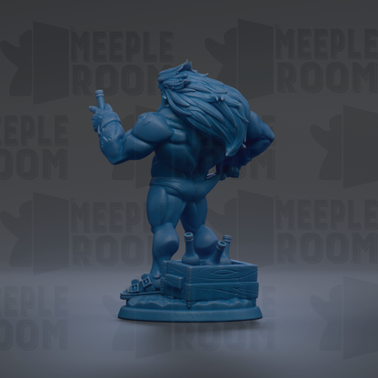 A blue, muscular statue of a man with long hair, holding a bottle, standing on a platform with a crate and other objects.