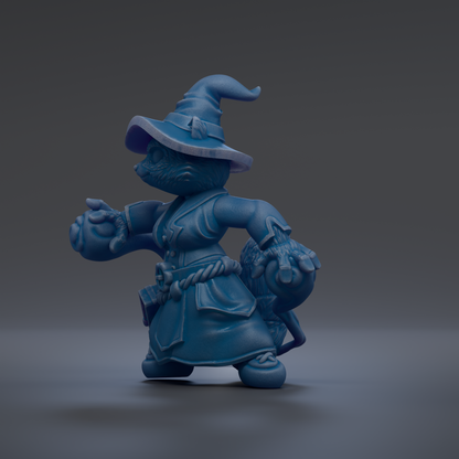 A blue, whimsical figurine of a wizard or magical character, with a pointed hat and various accessories, is depicted in the image.