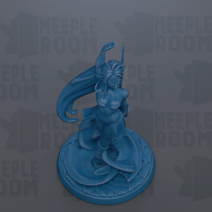 A blue figurine of a female character with flowing hair and a raised fist, standing on a circular base.