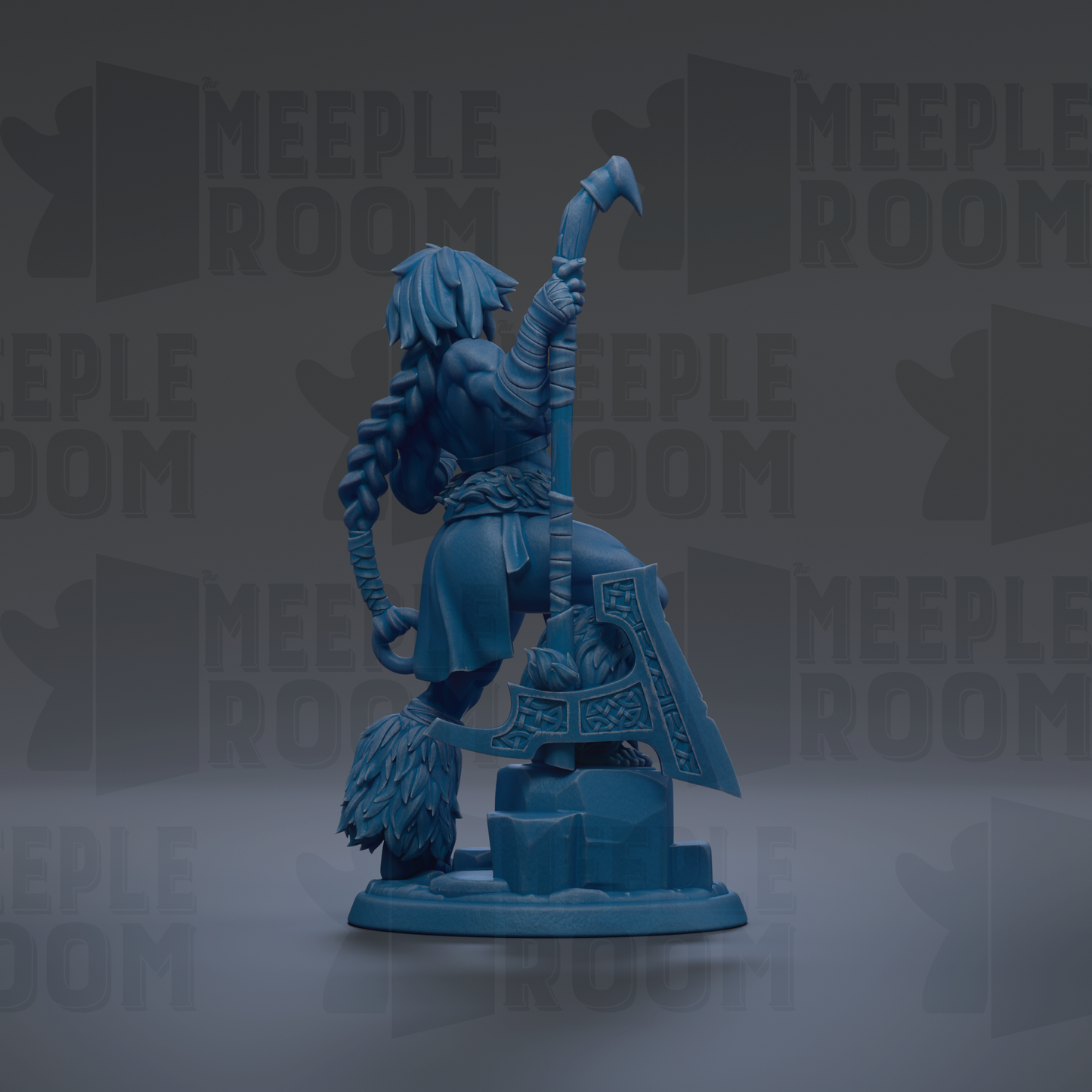 A blue figurine of a warrior figure holding a sword and shield, standing on a rock formation.