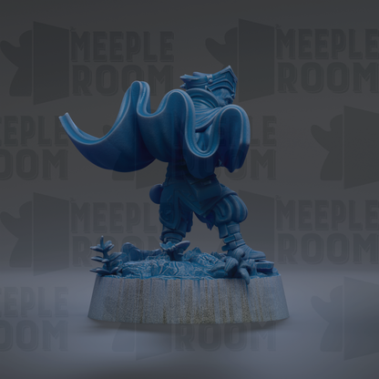 A blue statue of a person with a cape, standing on a pedestal.