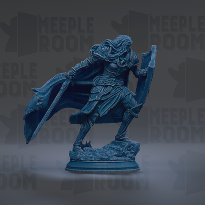 A blue statue of a warrior figure holding a shield and sword, standing on a rocky base.