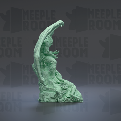 A green, 3D-rendered statue of a human figure with an extended arm, standing on a rock formation.