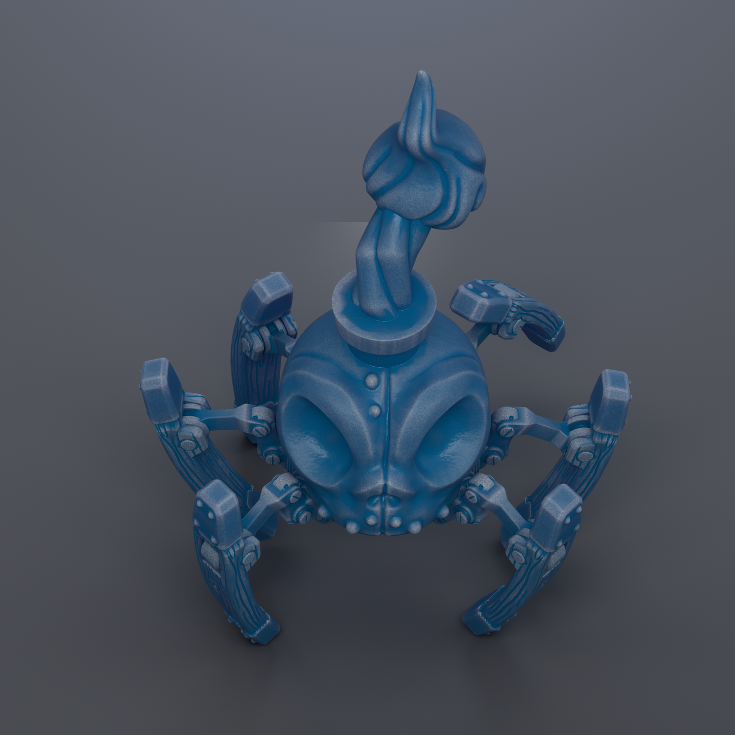 A blue, three-dimensional toy resembling a spider or cobra-like creature with a pointed head and legs.