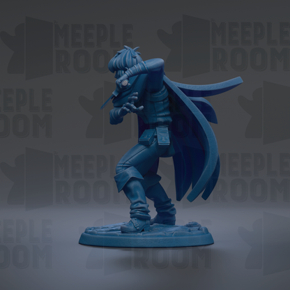 A blue figurine of a person with a cape and a sword, standing on a base.
