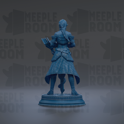 A blue statue of a person standing on a pedestal, holding a book in their hand.