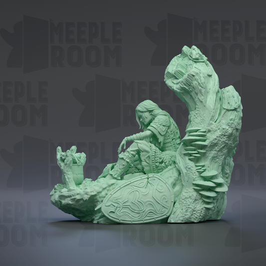 A green, 3D-rendered statue depicting a figure sitting on a rock formation, with a shield-like object in front of them.