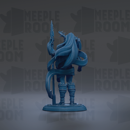 A blue figurine of a person holding a sword and shield, standing on a base.