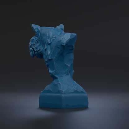 A blue, sculpted statue of a head is displayed against a dark background.