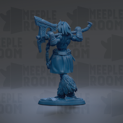 A blue figurine of a warrior figure holding a large weapon, standing on a base.