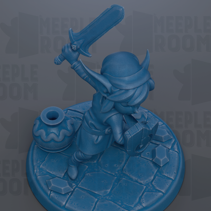 A blue figurine of a character holding a sword and shield, standing on a stone base.