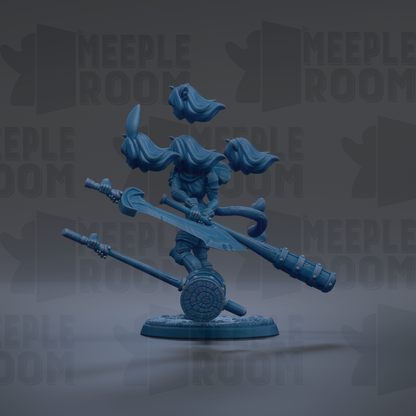 A blue figurine of a character with long hair, holding a sword and shield, standing on a platform.