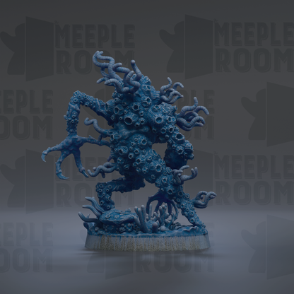 a large, intricate blue figurine with a detailed, organic design.