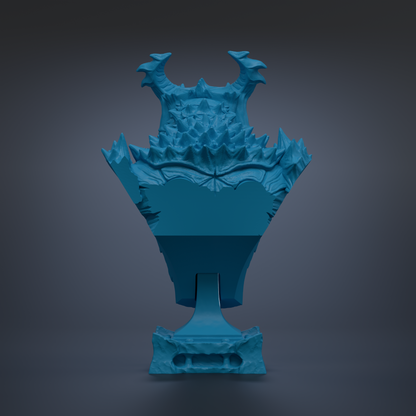 A blue, ornate vase or sculpture with intricate details and a textured surface, standing alone against a dark background.