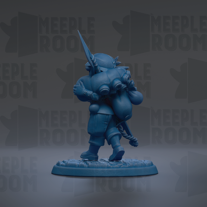 A blue figurine of a person holding a large object, possibly a bag or a shield, standing on a platform.