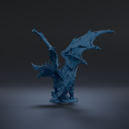 A 3D rendering of a blue dragon-like creature with sharp teeth and claws, standing on a base and facing to the right.