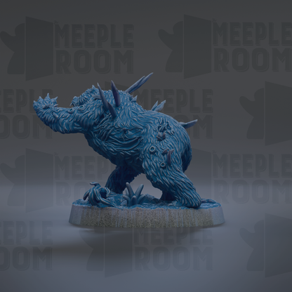 A 3D rendering of a blue, furry creature with spikes on its back, sitting on a base.