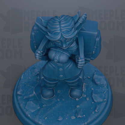 A blue figurine of a person with horns and a backpack, standing on a rocky surface.