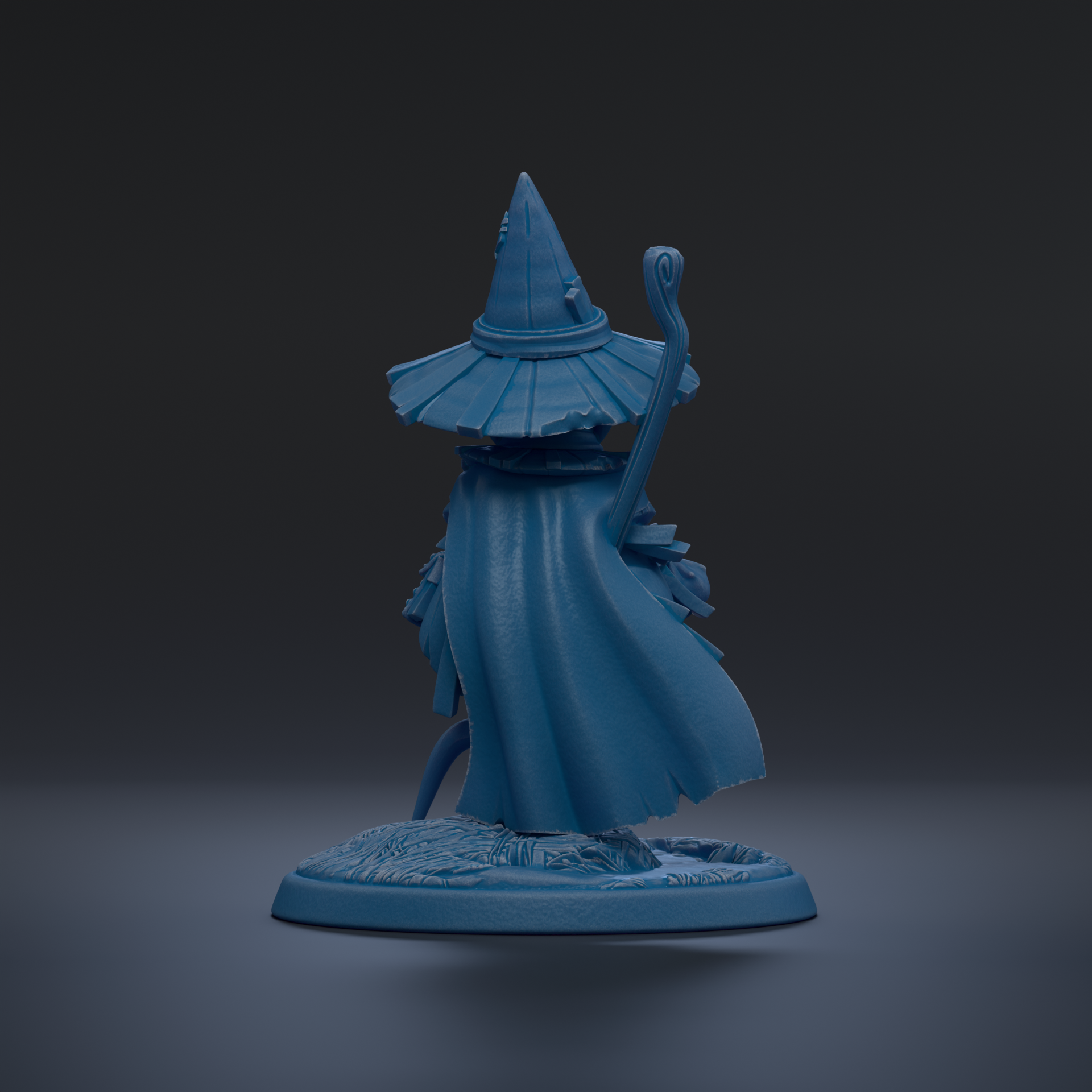 A blue figurine of a wizard or magical figure, wearing a pointed hat and holding a staff, standing on a base against a dark background.