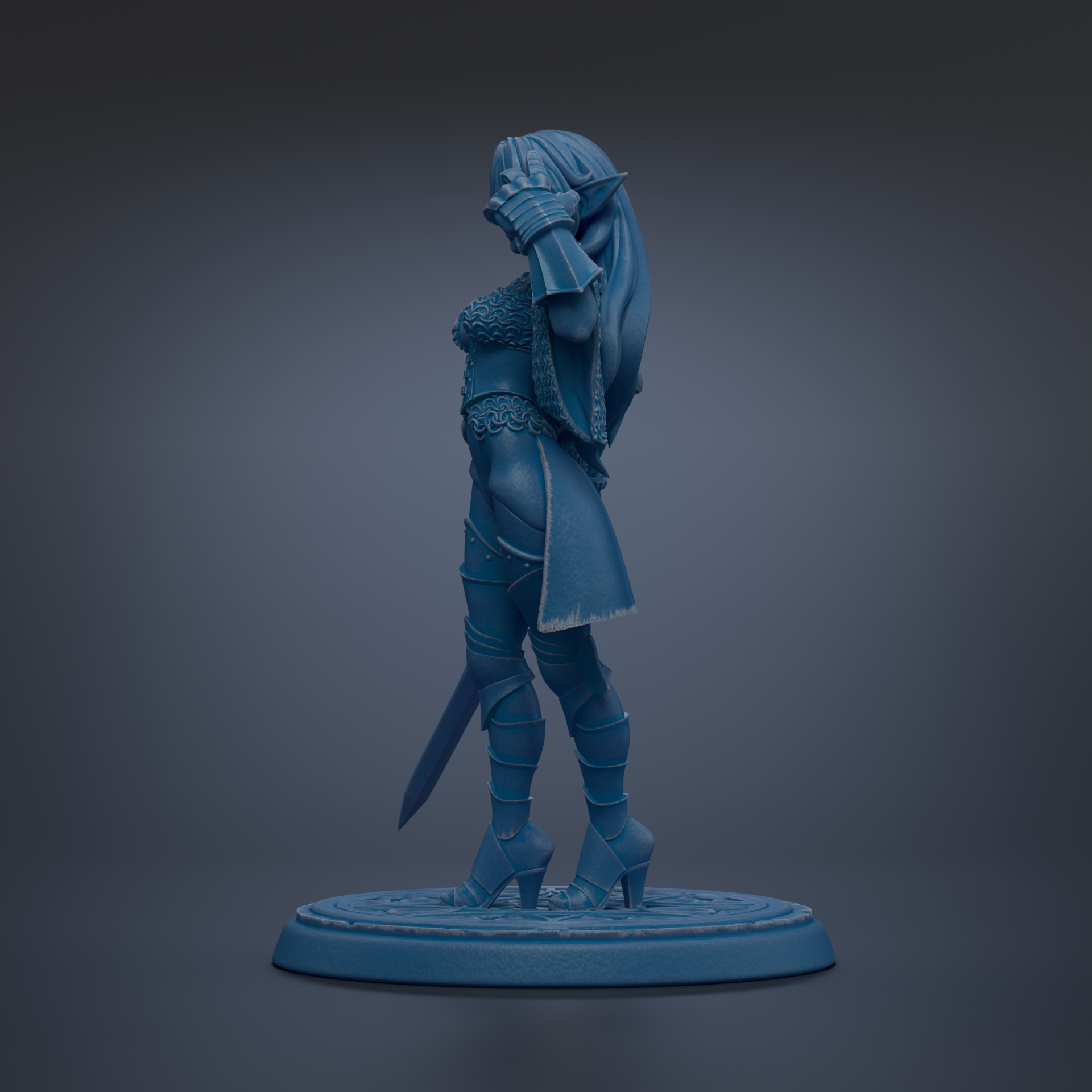 A blue statue of a woman with a sword and a flowing dress stands on a circular base against a dark background.