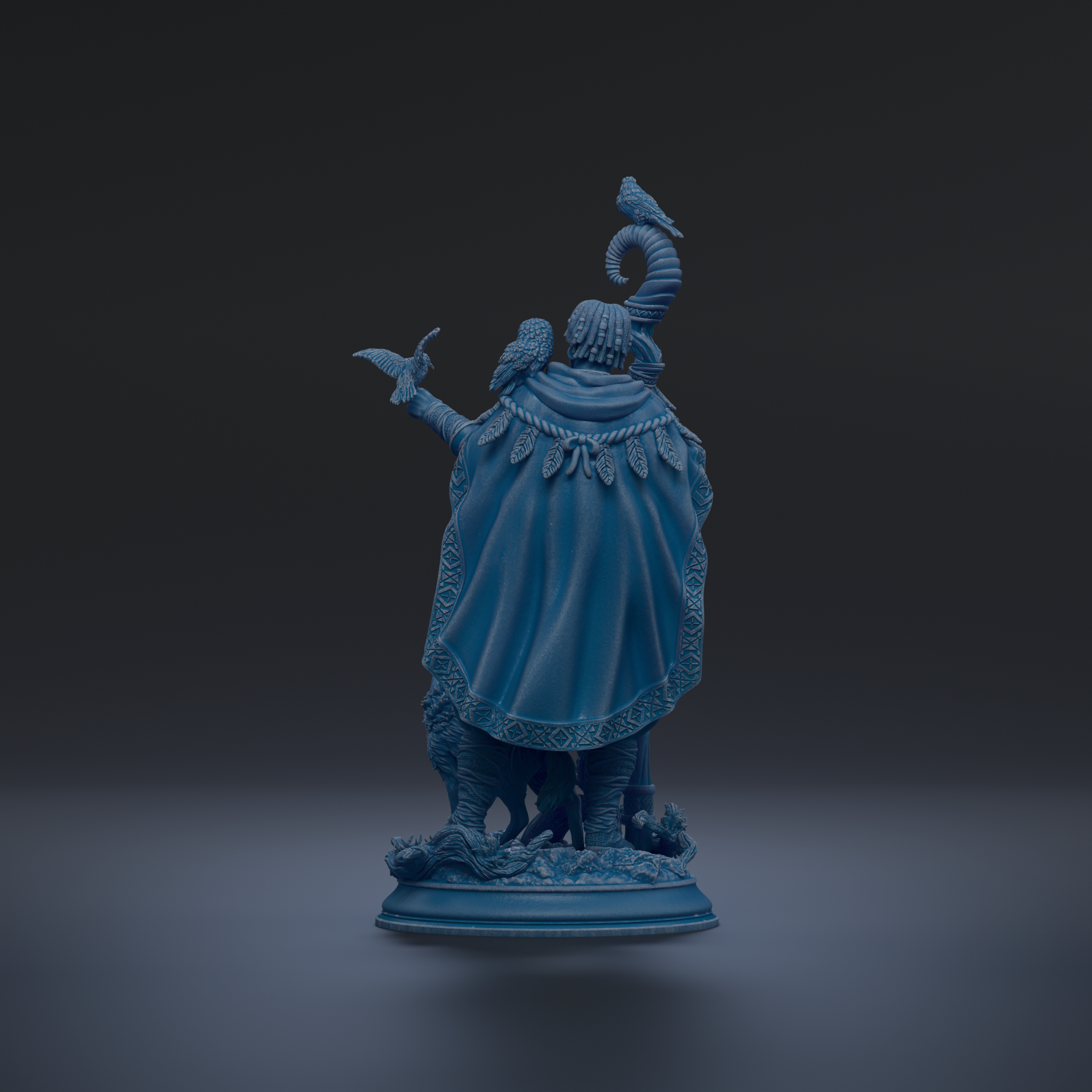A blue statue of a figure with a long, flowing cape and a bird perched on its head, standing on a pedestal.