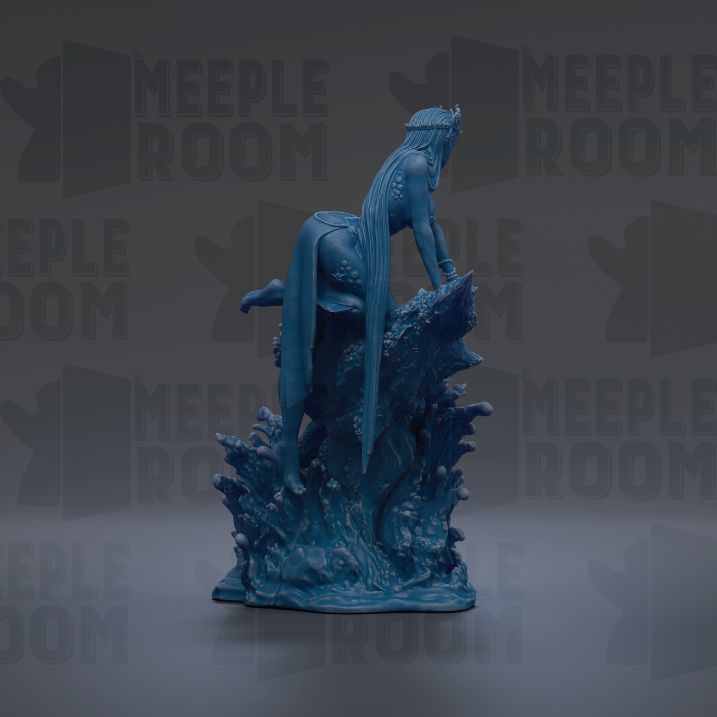 A blue figurine of a woman with long hair and a crown, sitting on a rock formation, is the main focus of the image.