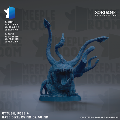 a blue plastic model of a monster with its mouth open