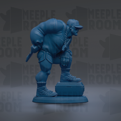 A blue statue of a person in a baseball uniform, holding a baseball bat, standing on a box.