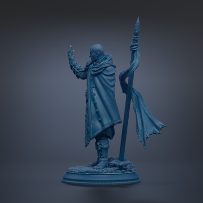 A blue statue of a person standing on a base, holding a flag and wearing a cape.