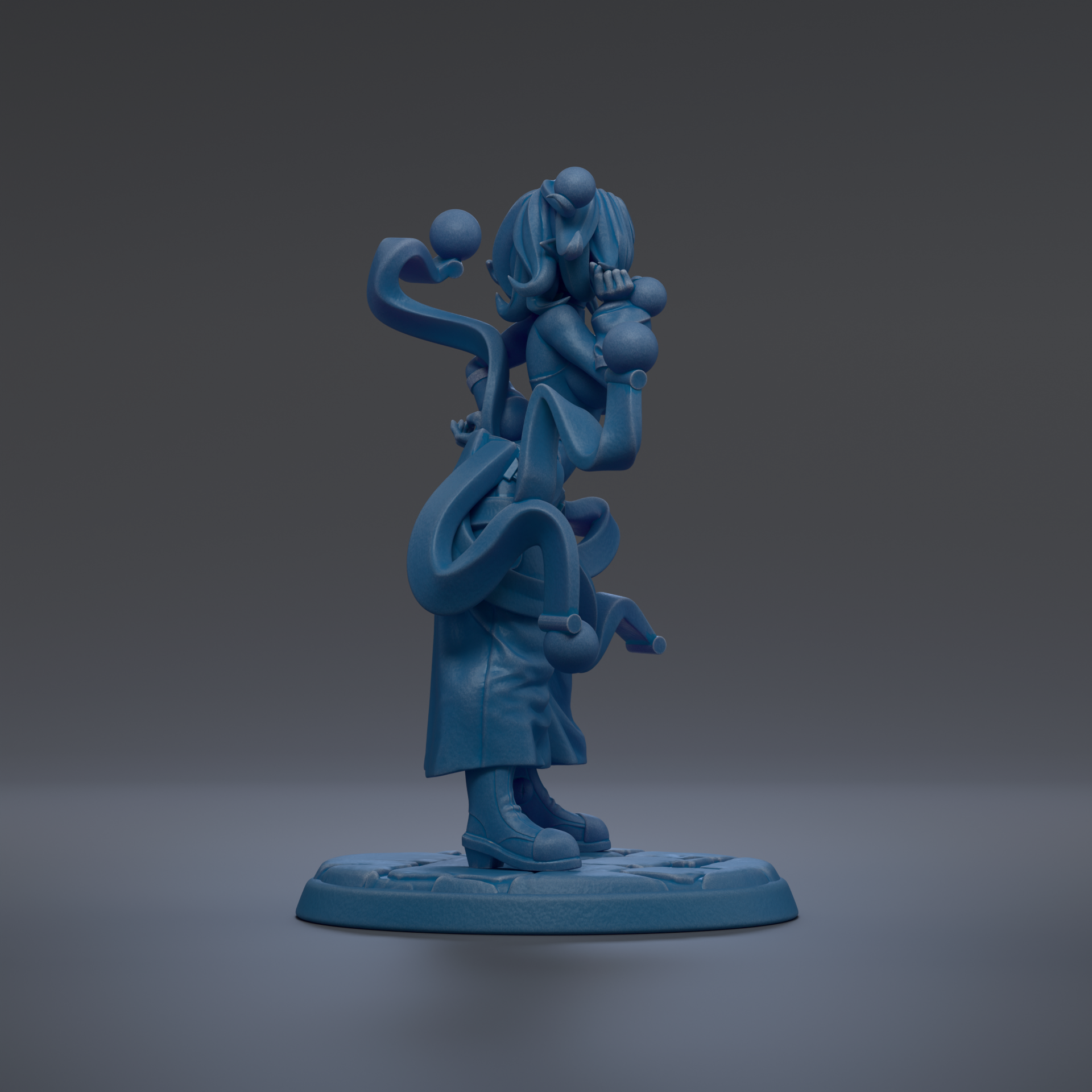 A blue, abstract sculpture with various shapes and forms, including a figure with a head and body, as well as other organic and geometric elements.