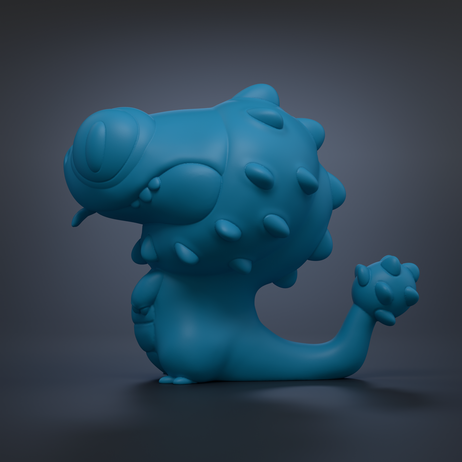 A blue, cartoon-like creature with spikes and a long, curved body is depicted in the image.