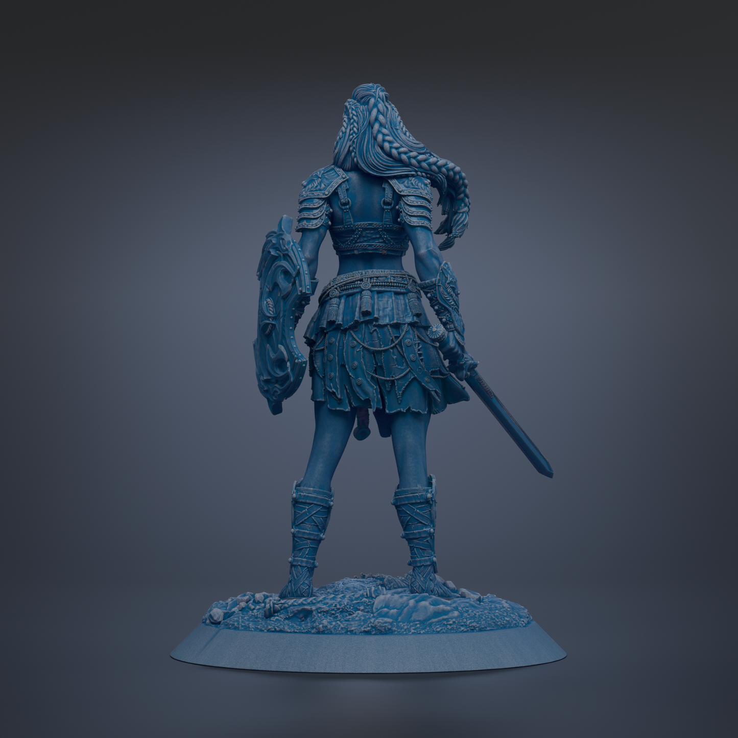 A statue of a warrior standing with a shield and sword, wearing a long skirt and boots.