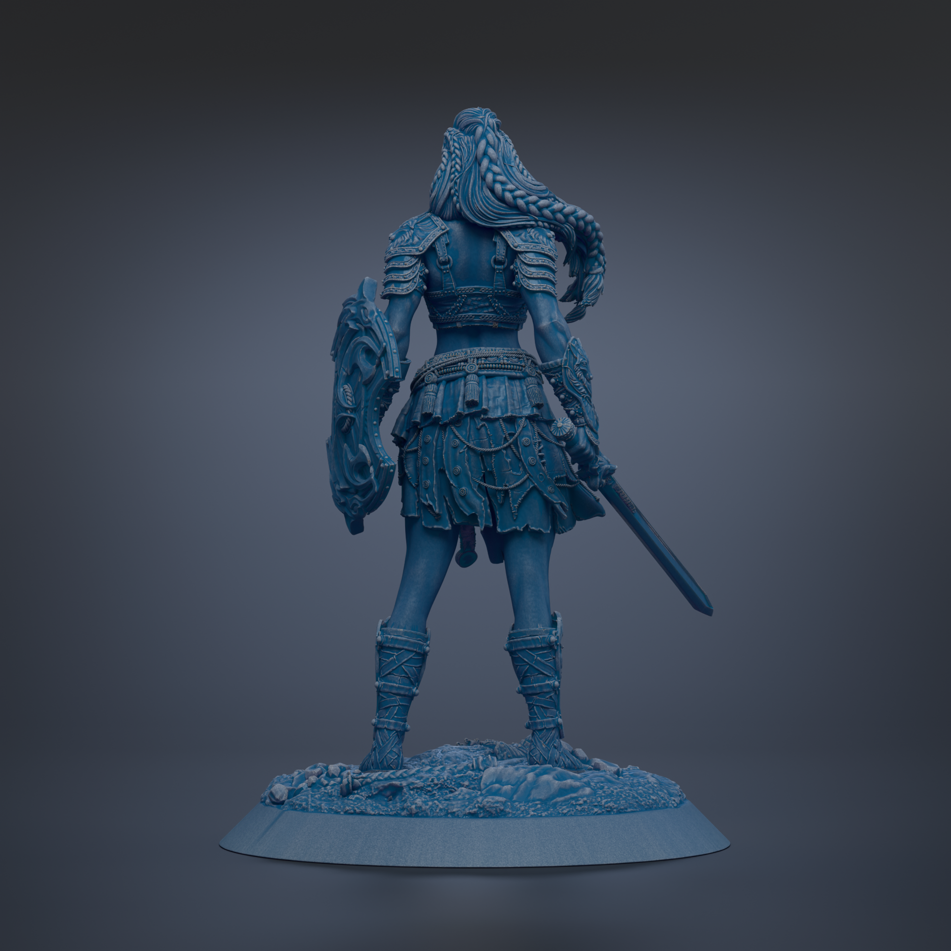 A statue of a warrior standing with a shield and sword, wearing a long skirt and boots.