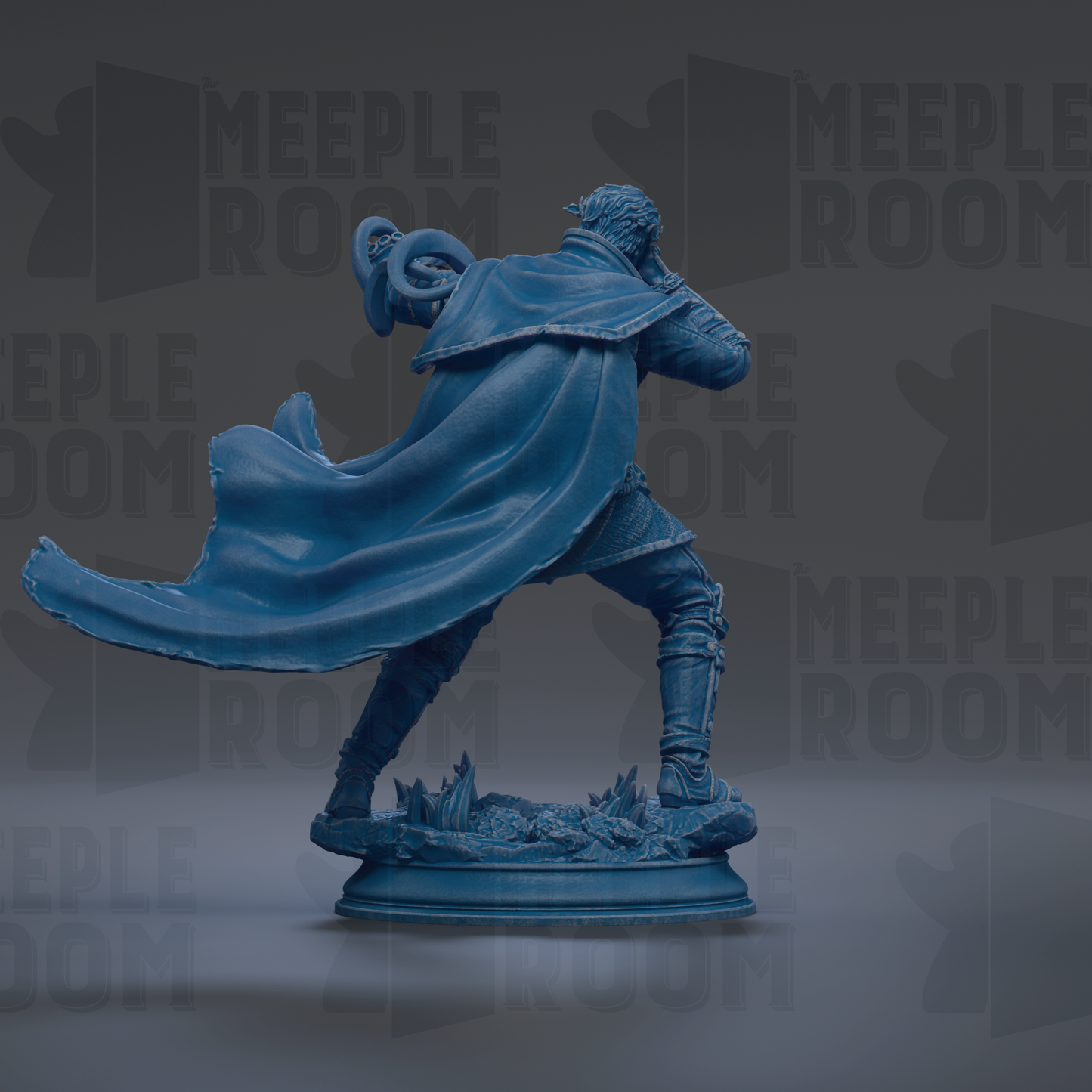 A blue statue of a person with a cape and a staff, standing on a pedestal.