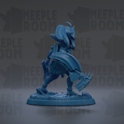 A blue figurine of a character with a large head and a sword, standing on a base.