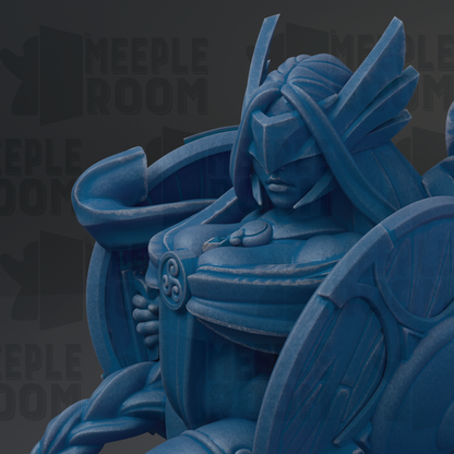 A close-up view of a blue, sculpted figure with a detailed, intricate design.