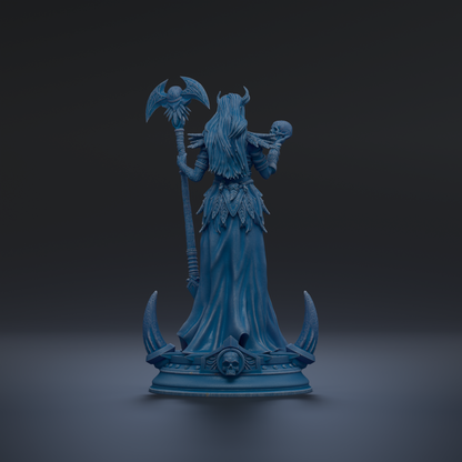 A blue statue of a woman with a long, flowing dress and a skull on her shoulder, holding a staff and standing on a pedestal.