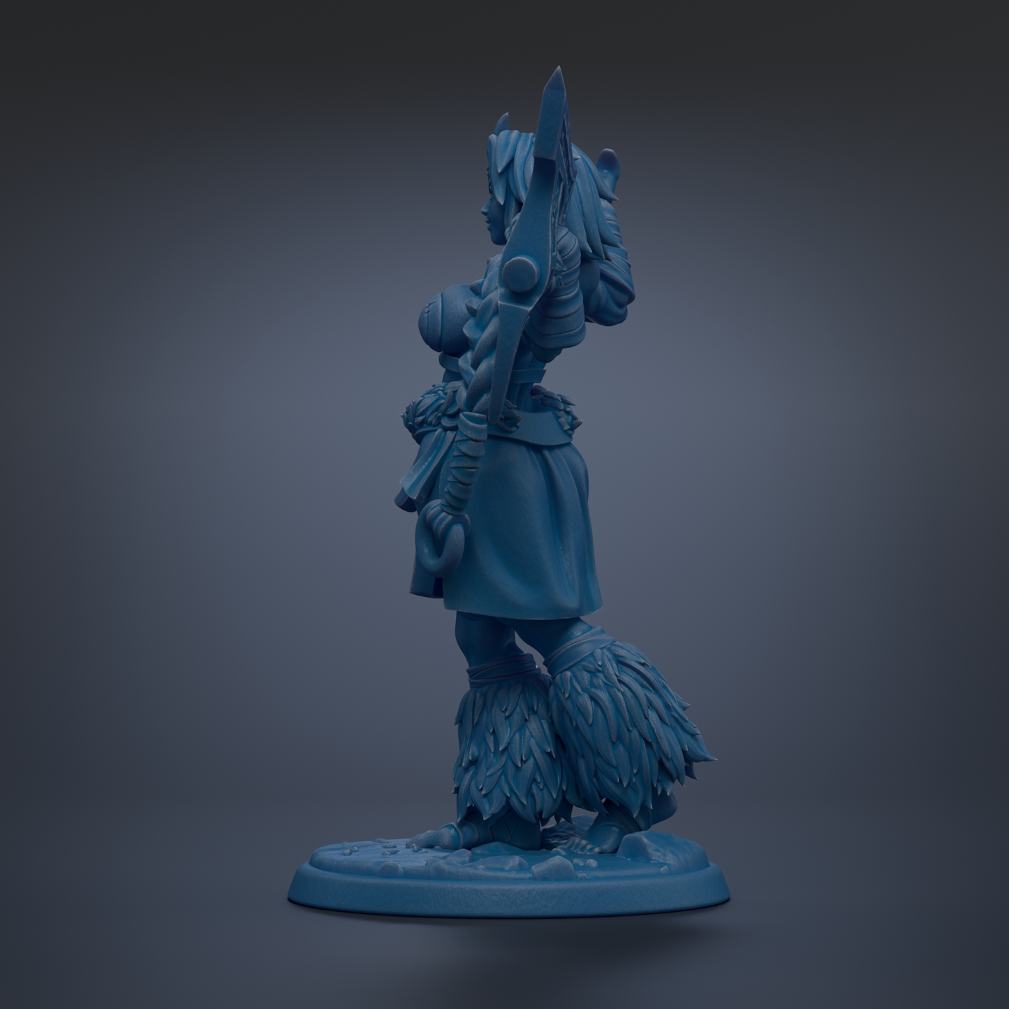 A blue figurine of a woman with a sword and a large animal on her back, standing on a base.