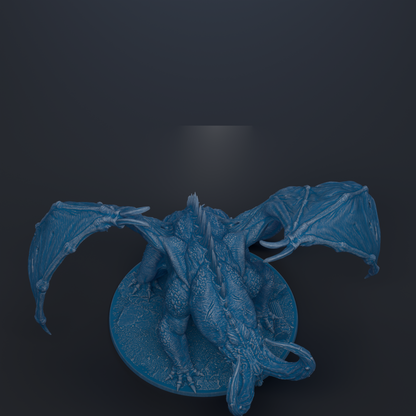 A blue dragon figurine with outstretched wings is depicted against a dark background.