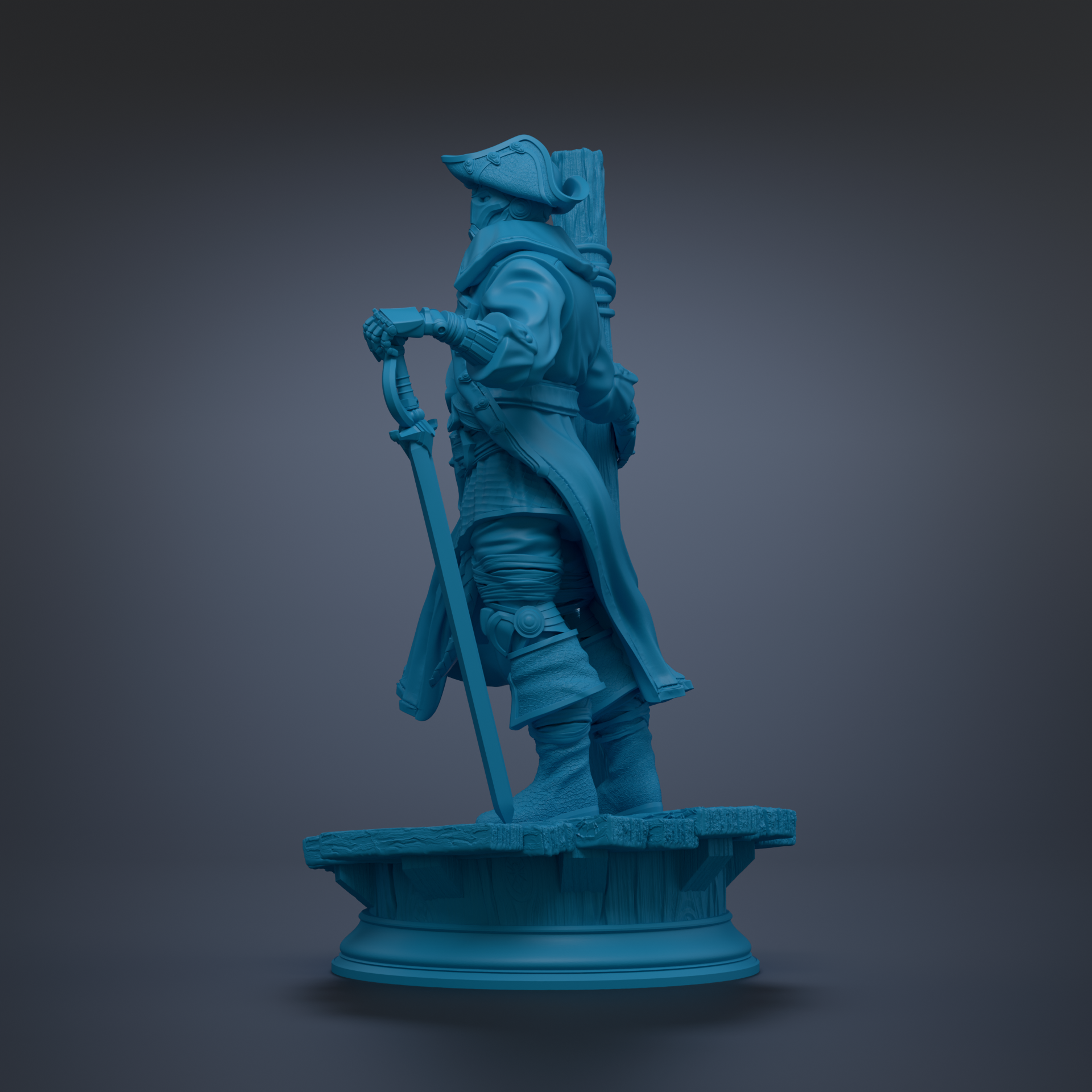 A blue statue of a person standing on a pedestal.